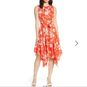 FLORAL SLEEVELESS HANDKERCHIEF HEM MIDI DRESS IN ORANGE